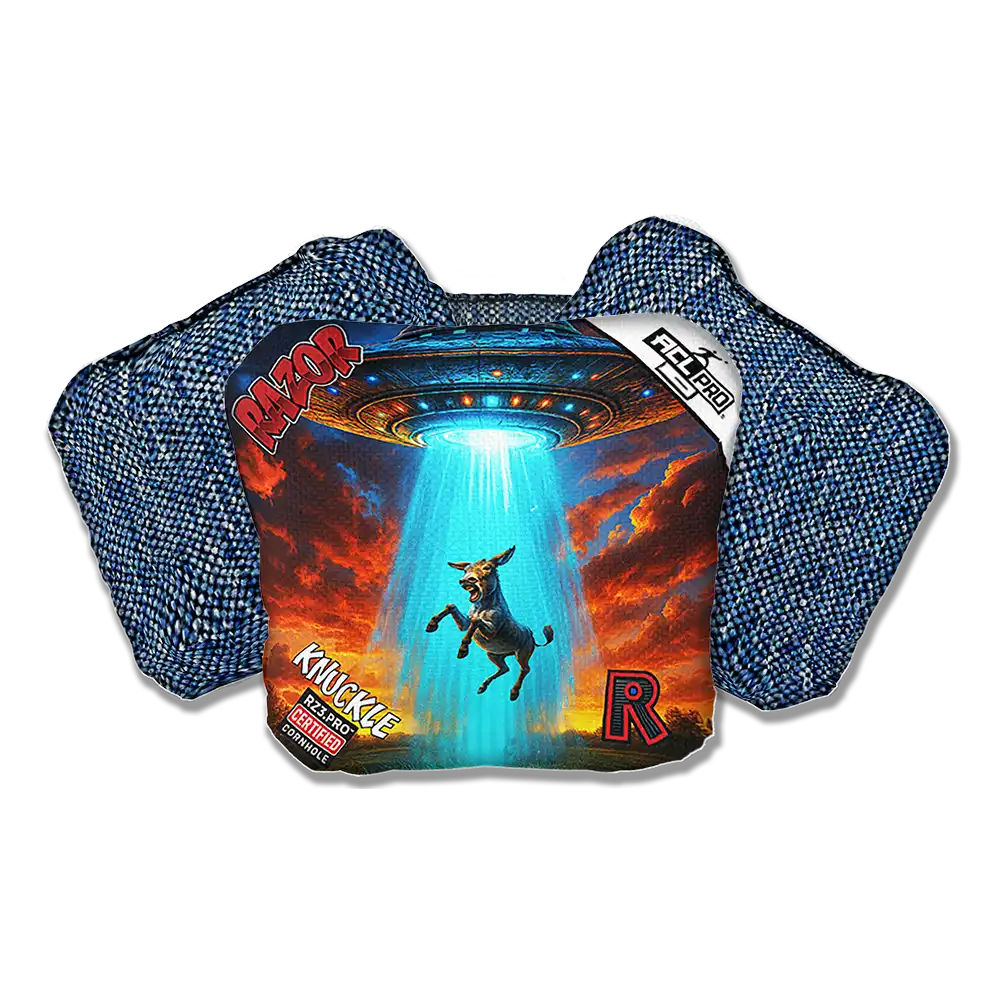 Cornhole bags with a graphic design featuring a dog and UFO on a white background
