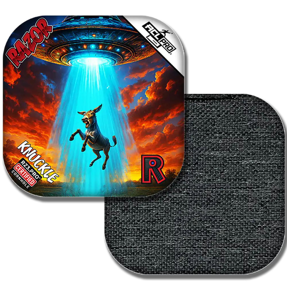 Foil razor with a graphic of a donkey being abducted by a UFO, featuring the brand 'Razor'.