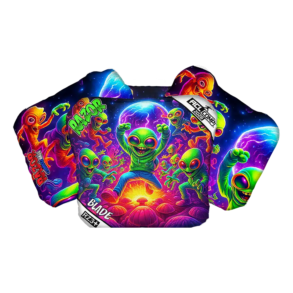 Colorful alien-themed cornhole bag with vibrant colors on a white background