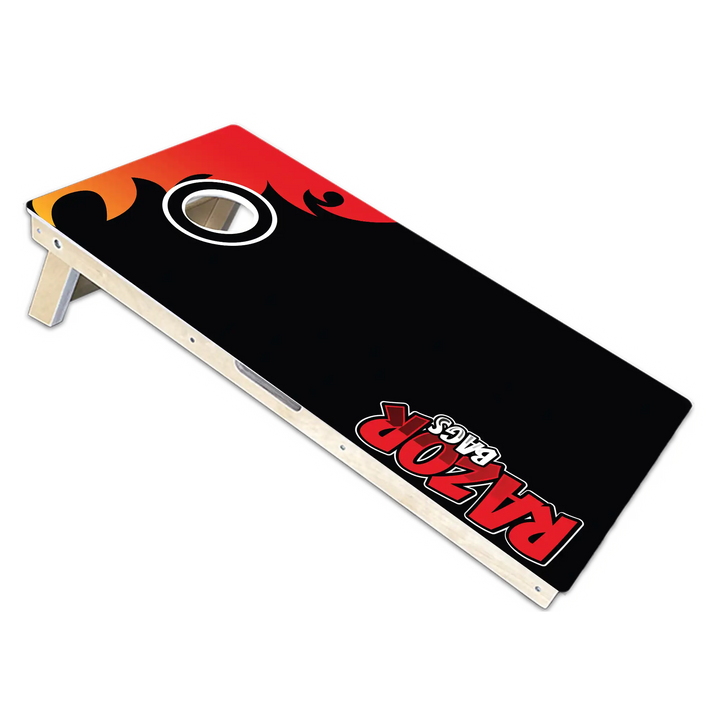 Cornhole board with red and black design on a white background