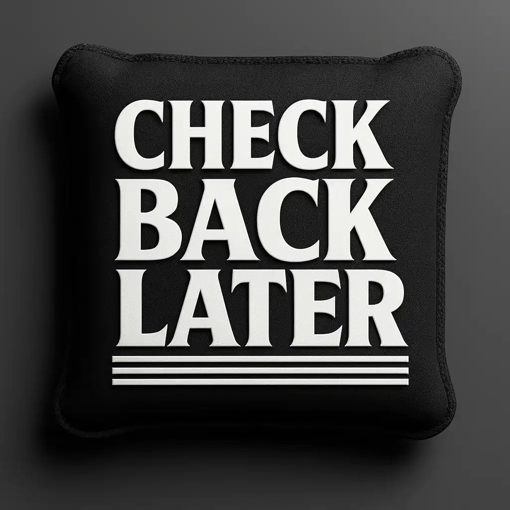 Cornhole bag with 'CHECK BACK LATER' text on a dark background