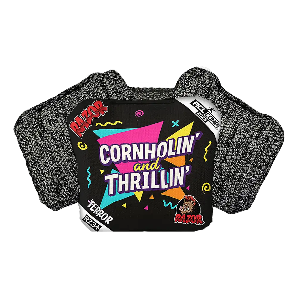 Cornhole bag with colorful design and text on a white background