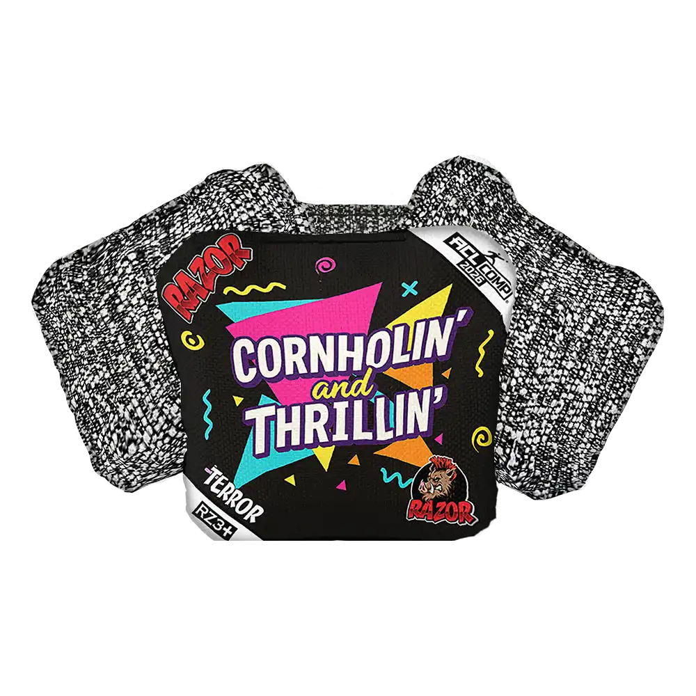 Cornhole bag with colorful design and text on a white background