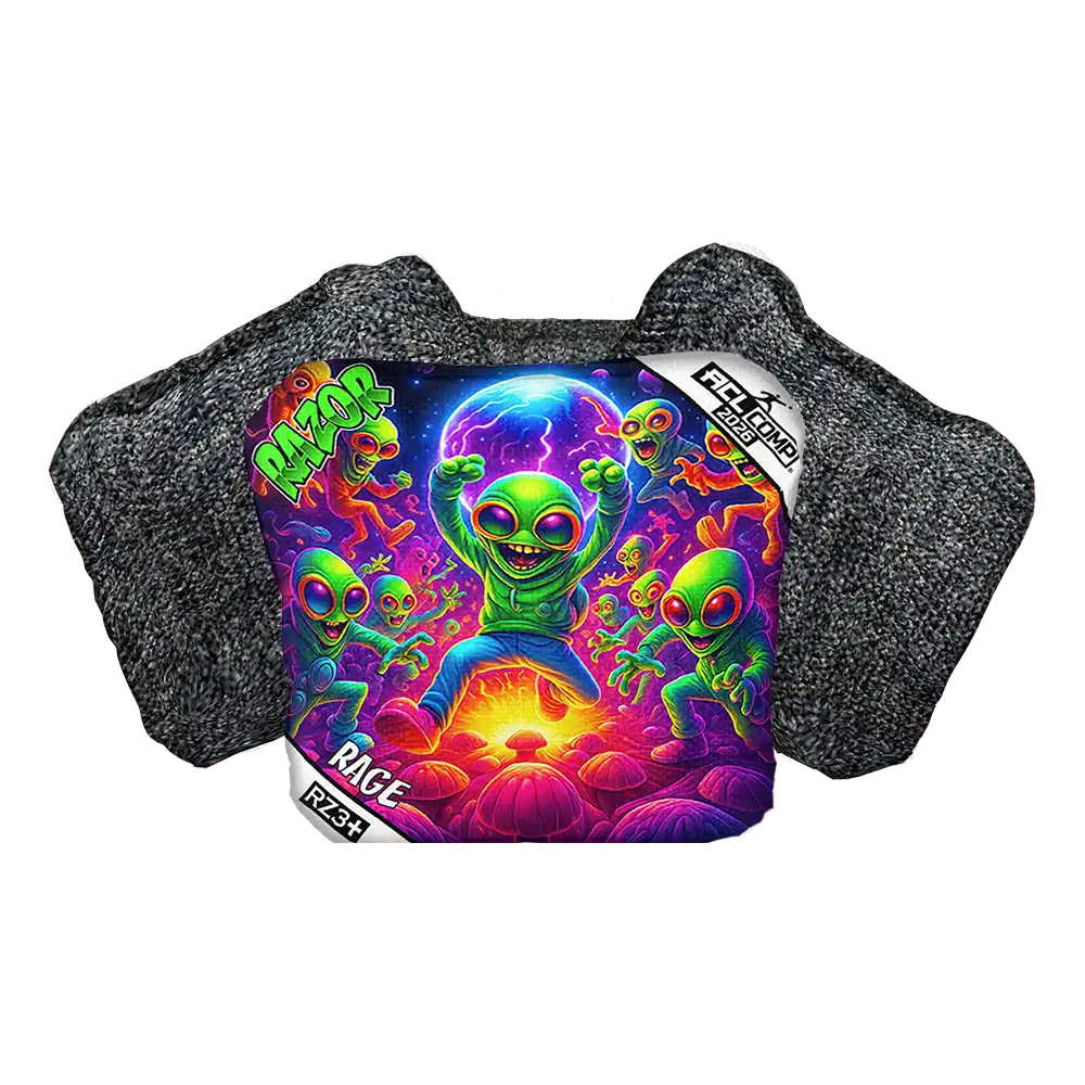 Colorful alien design on a cornhole bag with gray textured background
