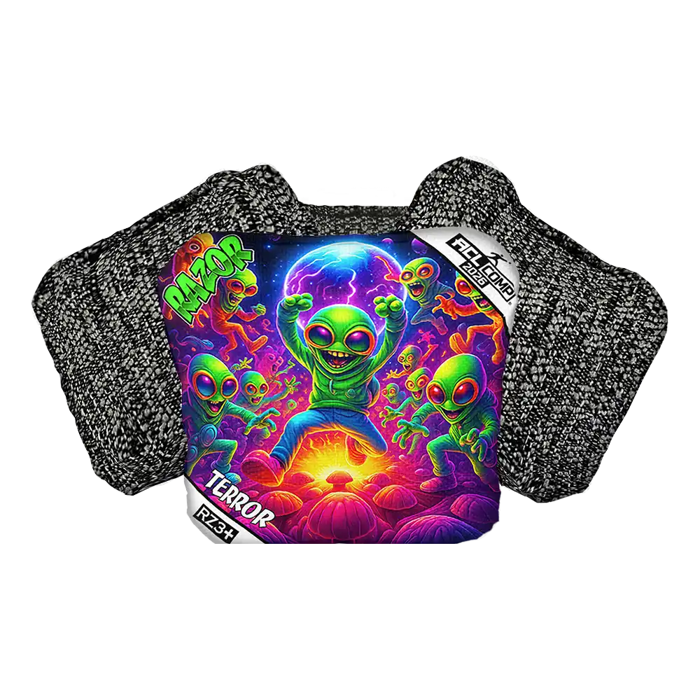 Cornhole bag with colorful alien design on a product packaging with 'RAZOR' branding.