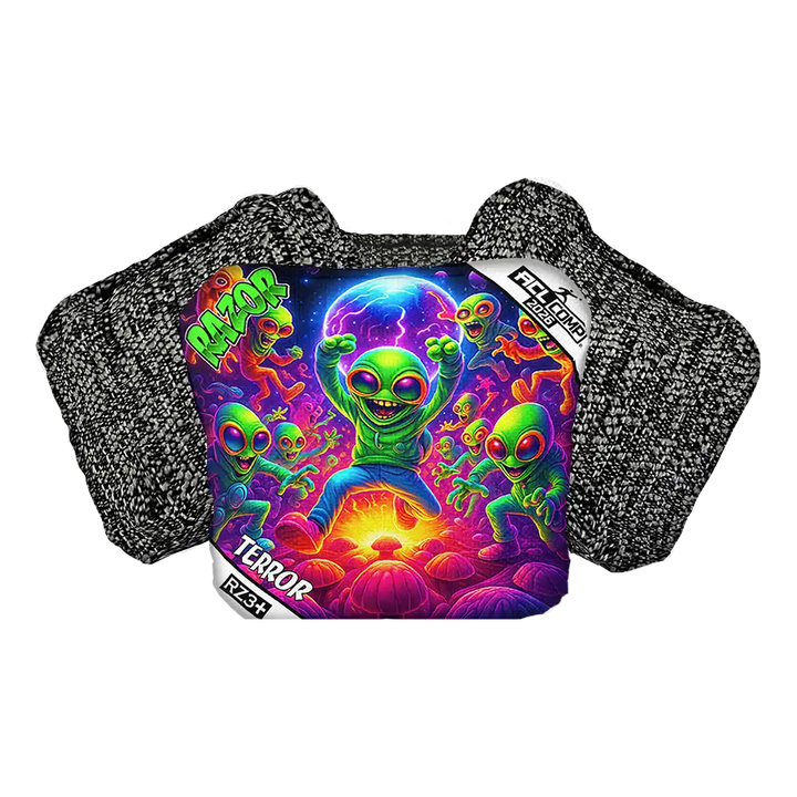 Cornhole bag with colorful alien design on a product packaging with 'RAZOR' branding.