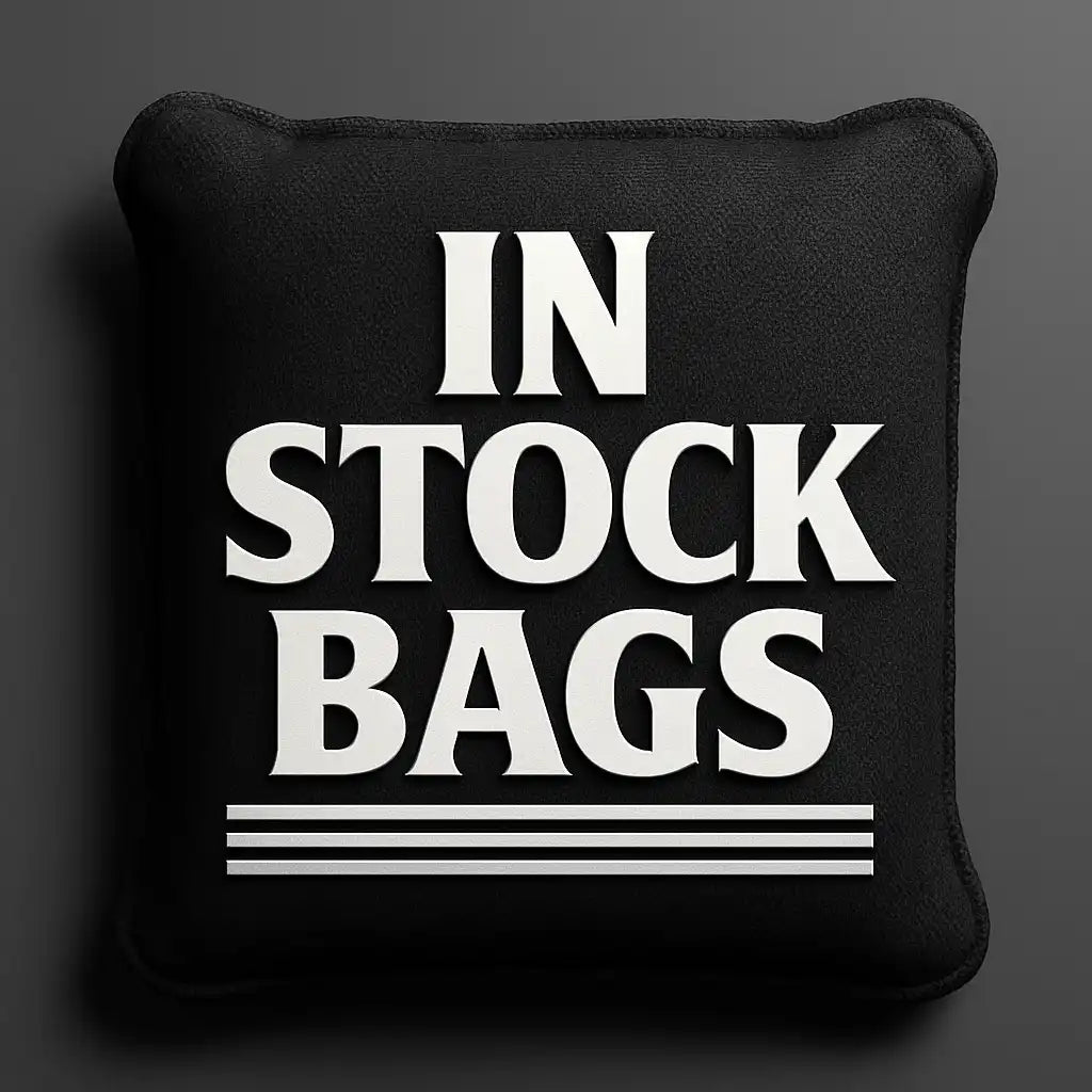 Cornhole bag with 'IN STOCK BAGS' text on a dark background