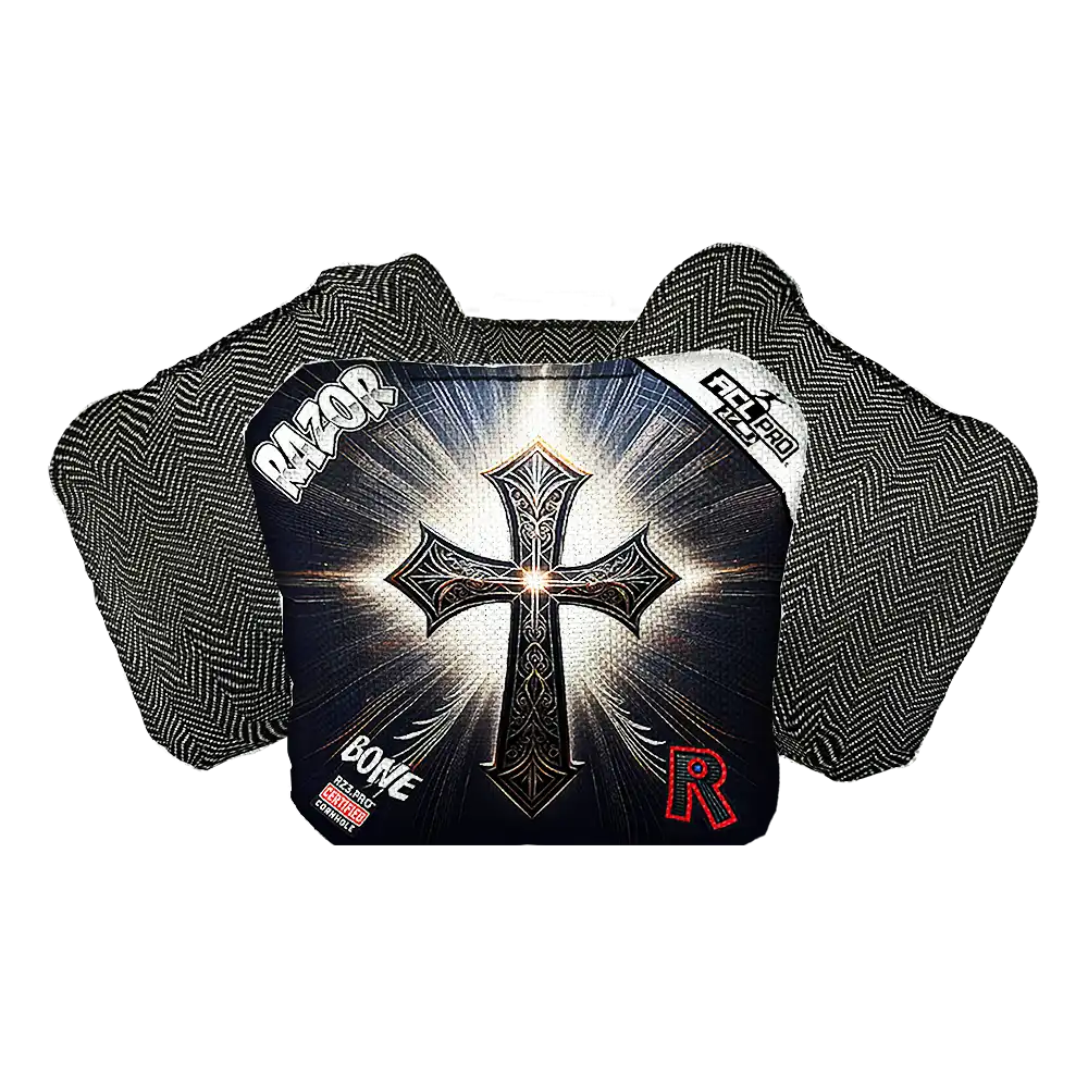 Black Cornhole bag with cross design and brand logos on a white background