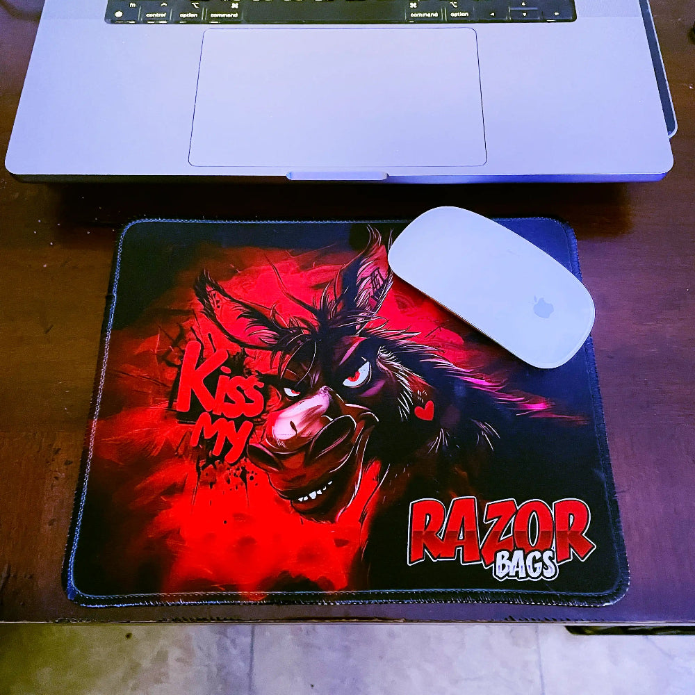 Mouse pad with a graphic design and 'Razor Bags' branding on a desk.