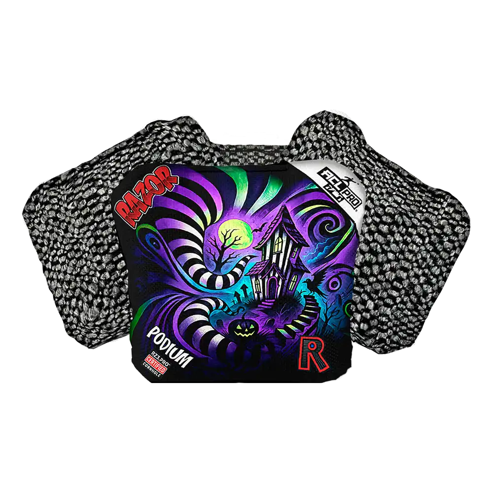 Colorful cornhole bag with intricate designs and brand logos on a white background