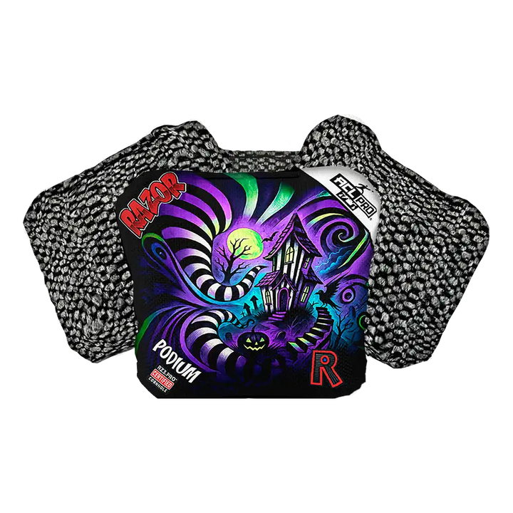 Colorful cornhole bag with intricate designs and brand logos on a white background