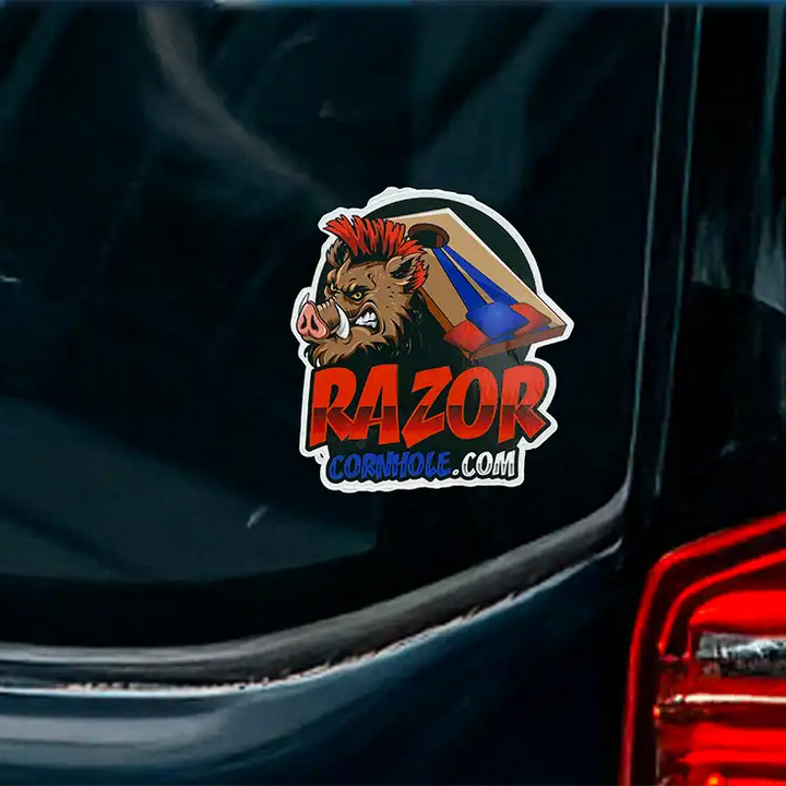 Sticker with a logo and text on a car's black surface