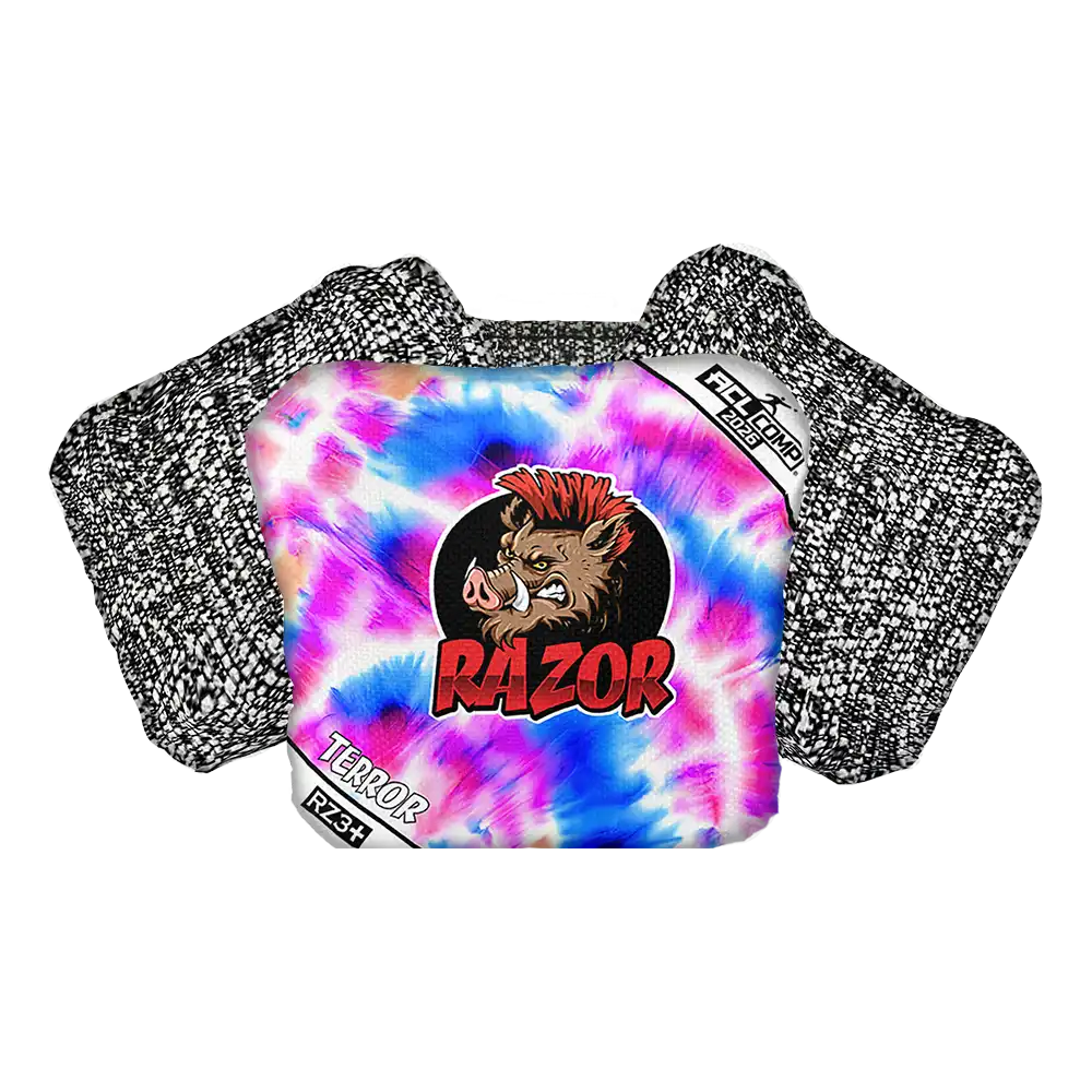 Colorful tie-dye cornhole bag with 'Razor' logo and text on a white background