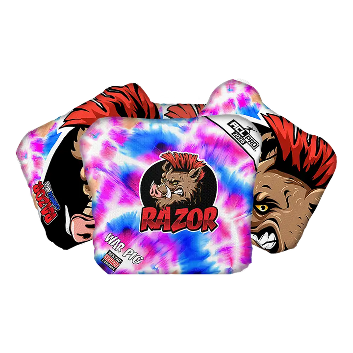 Colorful tie-dye Cornhole bags with 'RAZOR' branding and a graphic of a boar on a white background.