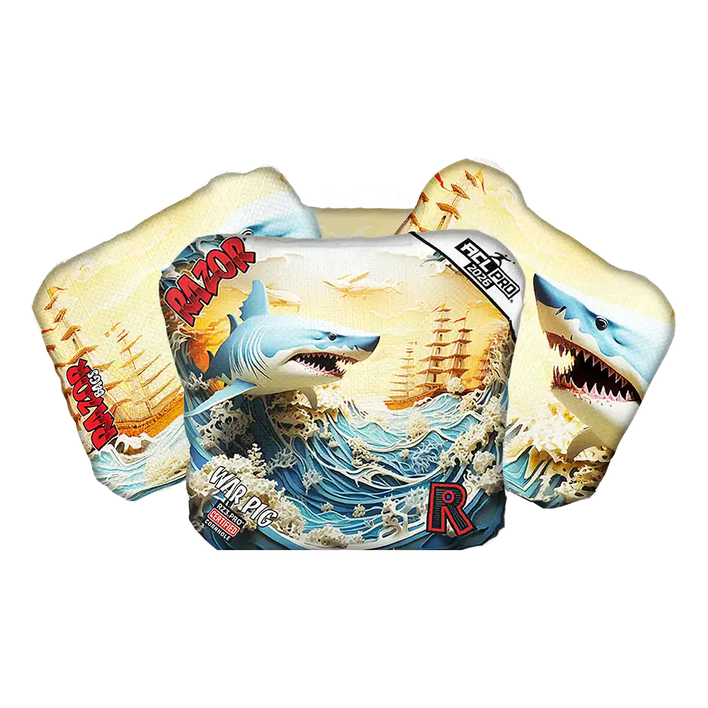 Cornhole bags with a shark and visible branding on a white background